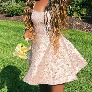 Macy’s pink, white, and gold floral print A line dress with lace up back.